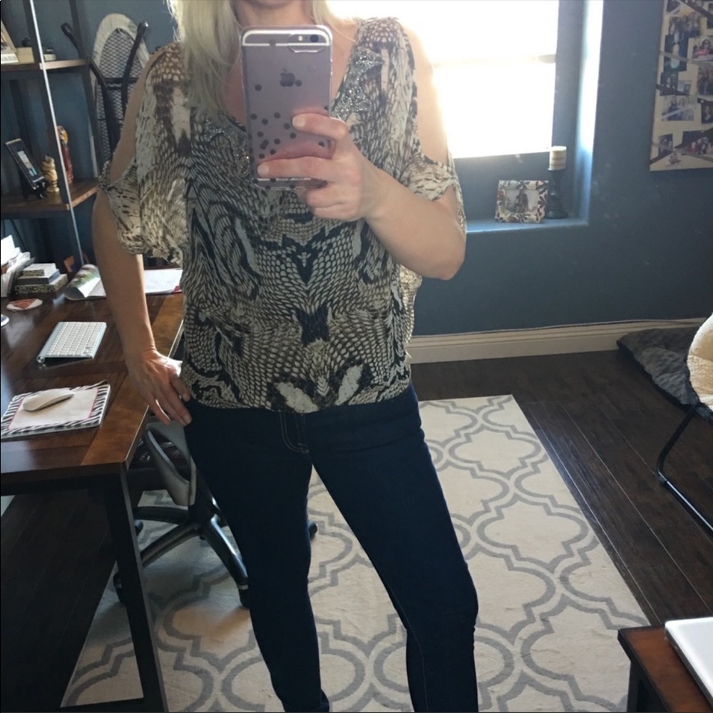 Animal print sheer shirt.